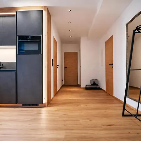 Апартаменты Blackstyle By Alpenluxus